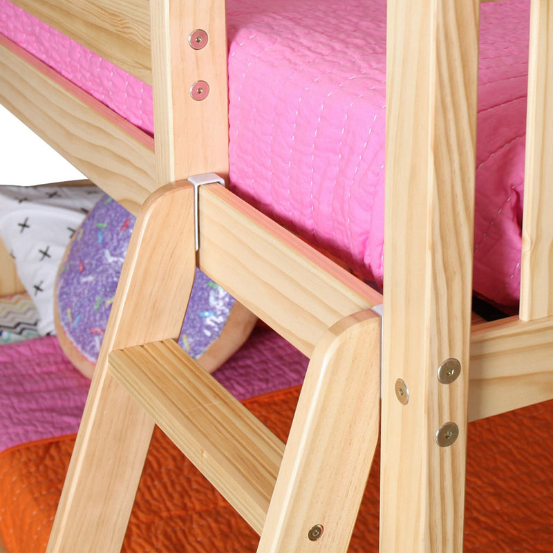 Wooden bunk bed ladder with colorful bedding in a children's bedroom.