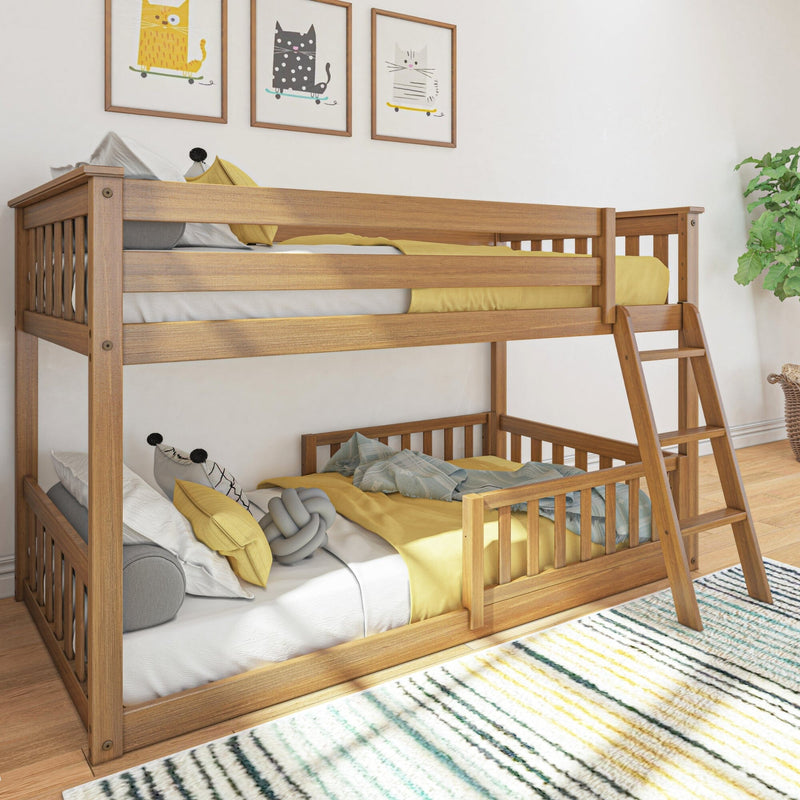 Wooden bunk bed in a bright children's room with colorful bedding and playful wall art.