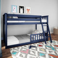 Modern navy blue wooden twin-over-twin bunk bed with ladder and safety rails in a children's bedroom with polka-dot bedding, colorful geometric rug, and animal wall art