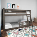 Gray wooden twin-over-twin bunk bed with ladder and safety rails in modern kids bedroom with patterned rug and animal wall art