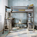 Modern twin loft bed in gray wood with built-in desk, ladder and shelving, chair and geometric rug in a light-blue kids' bedroom study nook