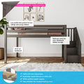 Low-profile dark gray wooden loft bed with staircase and built-in storage, solid pine construction in a child's bedroom with framed wall art and hardwood floor