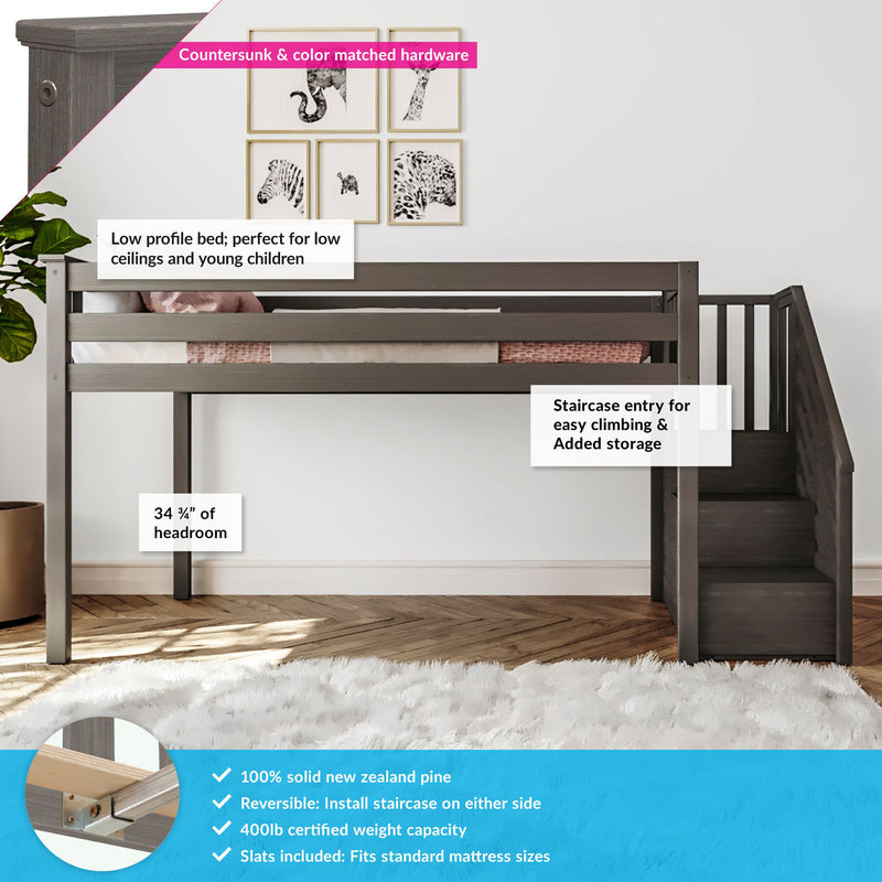 Low-profile dark gray wooden loft bed with staircase and built-in storage, solid pine construction in a child's bedroom with framed wall art and hardwood floor