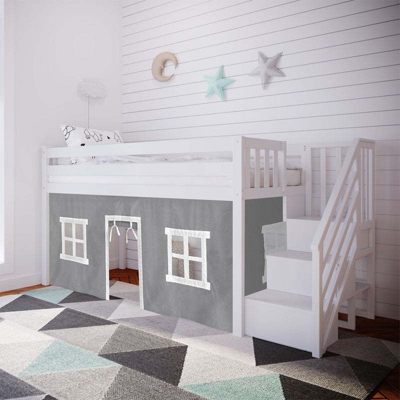 White loft bed with playhouse design and stairs in modern children's bedroom with geometric rug.