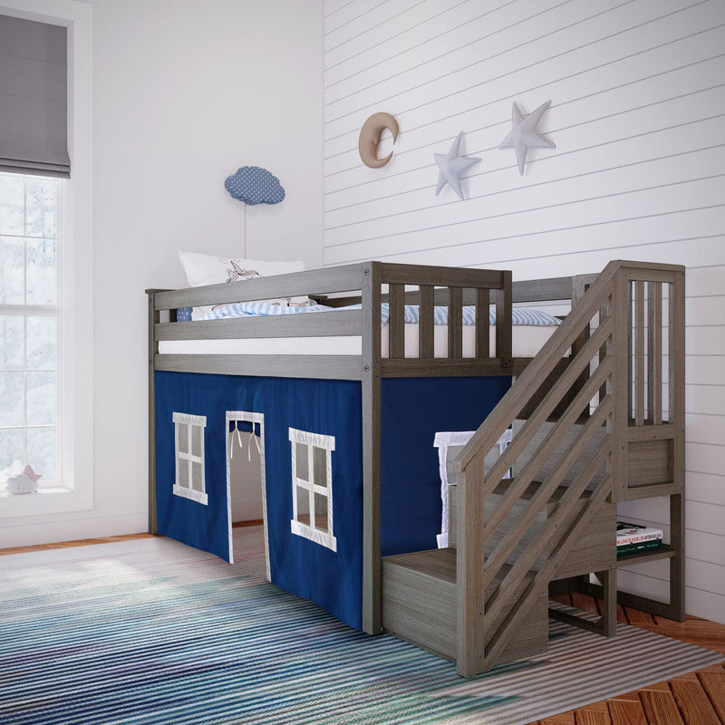 Children's loft bed with stairs and playhouse design in a modern bedroom.