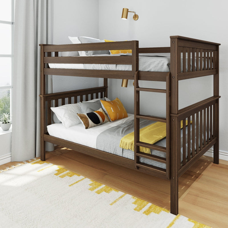 Dark wood bunk bed with ladder, gray bedding and yellow accent pillows in a modern kids' bedroom with brass wall sconce and hardwood floor