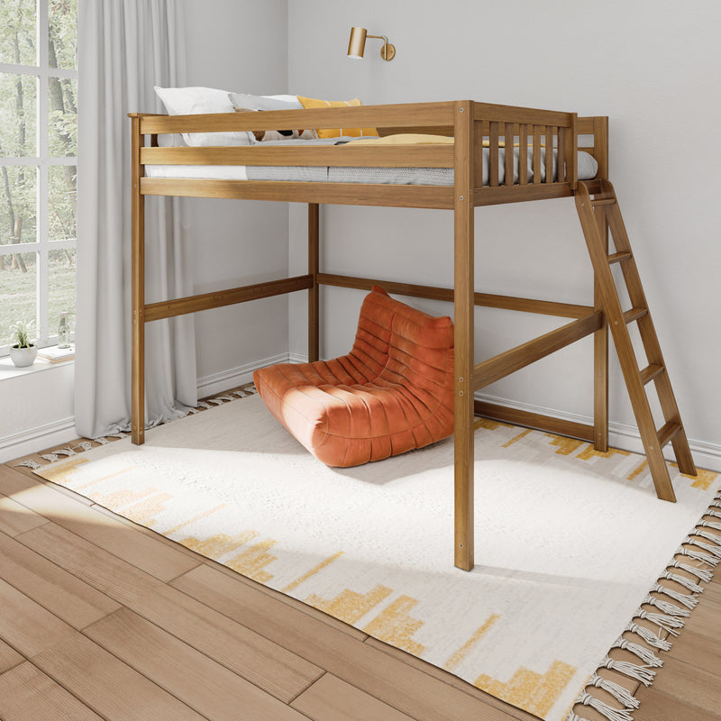 Wooden loft bed with orange lounge chair underneath, in a bright bedroom with large window and modern decor.