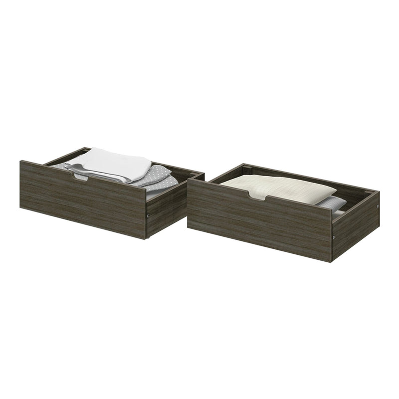 Set of two dark wood storage drawers filled with neatly folded clothes and bedding.