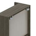 Gray wood wardrobe panel with two adjustable nylon sliding-door rollers and metal mounting brackets on the top edge for smooth cabinet door operation