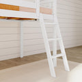 White wooden bunk bed ladder in modern bedroom interior.