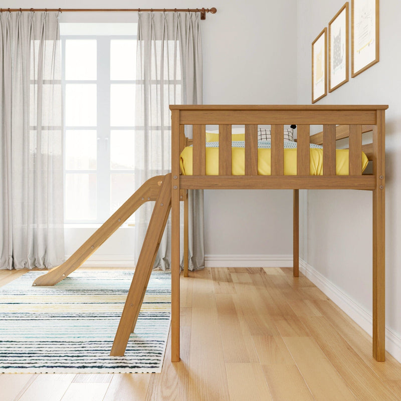 Wooden loft bed with slide in bright children's room.