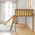 Wooden kids loft bed with slide and yellow bedding in bright modern children's bedroom with striped rug, sheer curtains and framed wall art