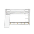 White wooden twin-over-twin kids bunk bed with built-in slide and ladder, slatted guardrails and space-saving loft design