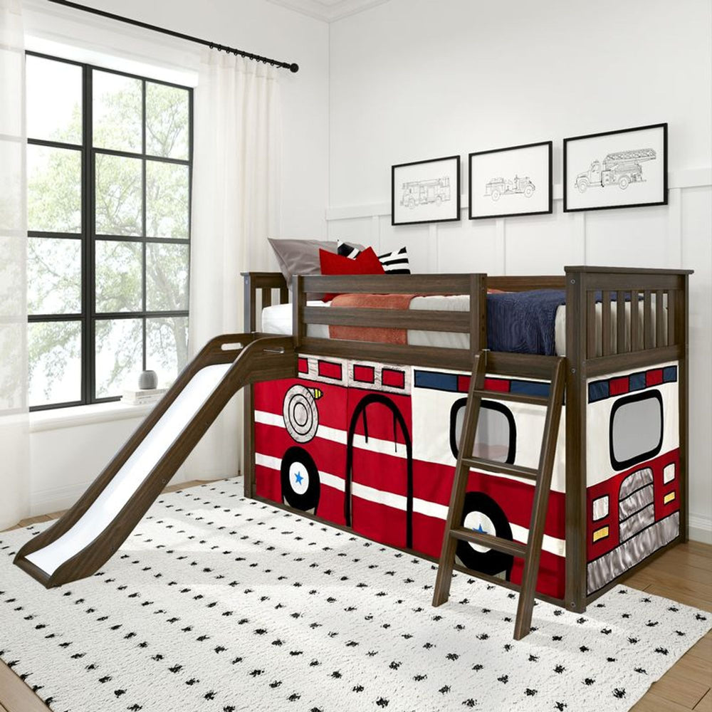 Fire truck-themed kids' loft bed with slide, ladder, and colorful bedding in a bright bedroom setting.