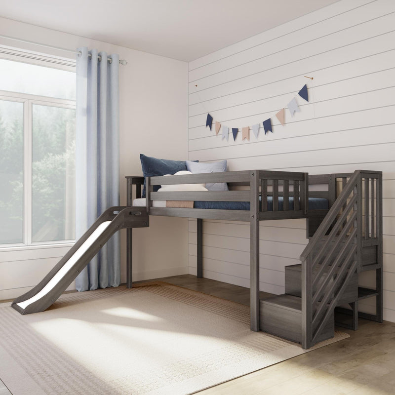 Children's loft bed with slide and stairs in a modern bedroom, featuring a white shiplap wall and natural light from a large window.