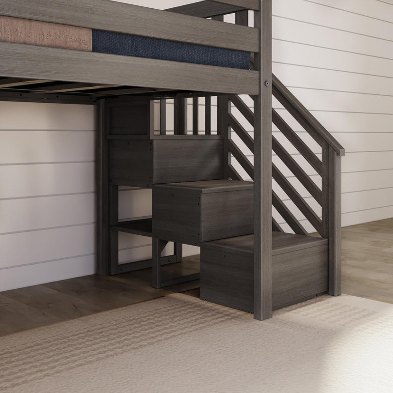 Loft bed with integrated wooden stairs and storage steps against a shiplap wall, perfect for maximizing small bedroom space.