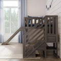 Modern gray wooden bunk bed with slide in bright kids' bedroom, blue curtains, shiplap wall and pennant garland