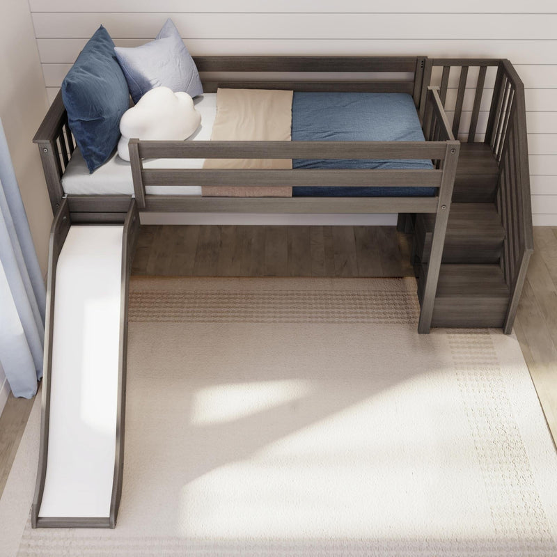 Children's loft bed with slide and stairs in modern bedroom setting.