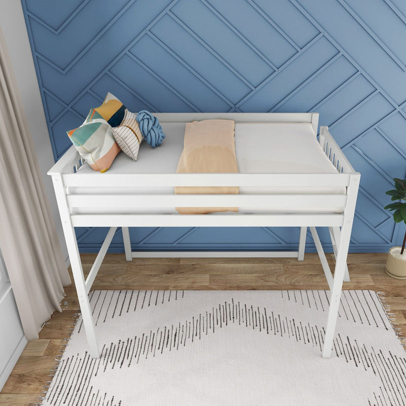 White loft bed with colorful pillows and blankets against a geometric blue wall in a modern bedroom.