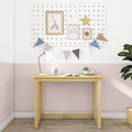 Wooden kids desk with white lamp, alarm clock, succulent and pastel pegboard wall art with bunting — children's study nook, nursery decor, Scandinavian minimalist style