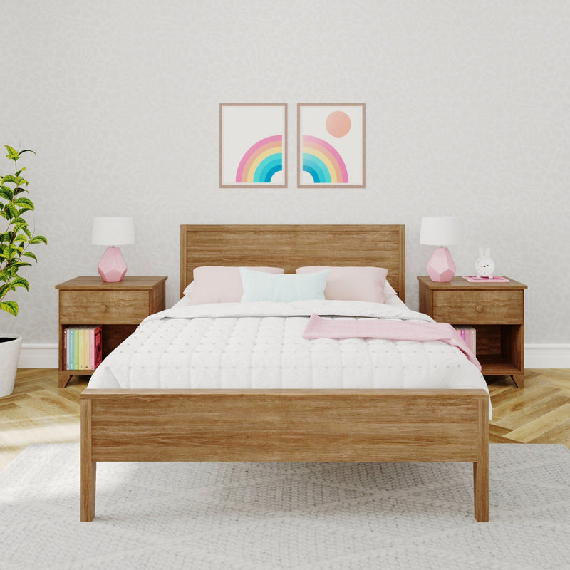 Cozy modern bedroom with wooden bed frame, colorful wall art, and pastel decor.