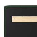 Close-up of dark green textured upholstered headboard corner with black backing, light wood mounting bracket and visible screw