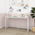 White minimalist writing desk in pastel pink children's room with desk lamp, bunting, succulent and potted plant — modern small-space study table