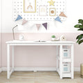 Modern white kids desk with built-in shelves and storage bins in pastel pink nursery, decorated with bunting, desk lamp, alarm clock and succulent