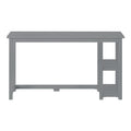 Gray wooden writing desk with rectangular top and built-in open shelves on the right, compact modern home office desk