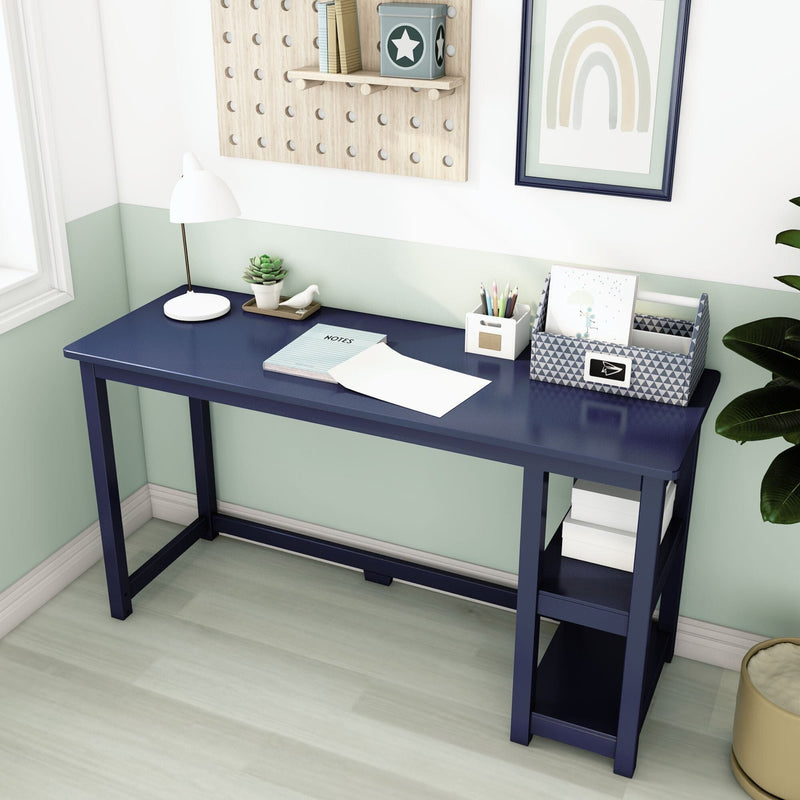 Blue study desk with stationery and decor items in a modern home office setting.