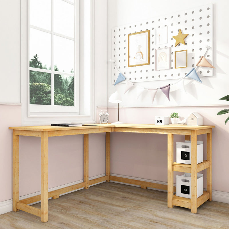 L-shaped wooden desk in a bright room with wall decorations and natural light from a large window.
