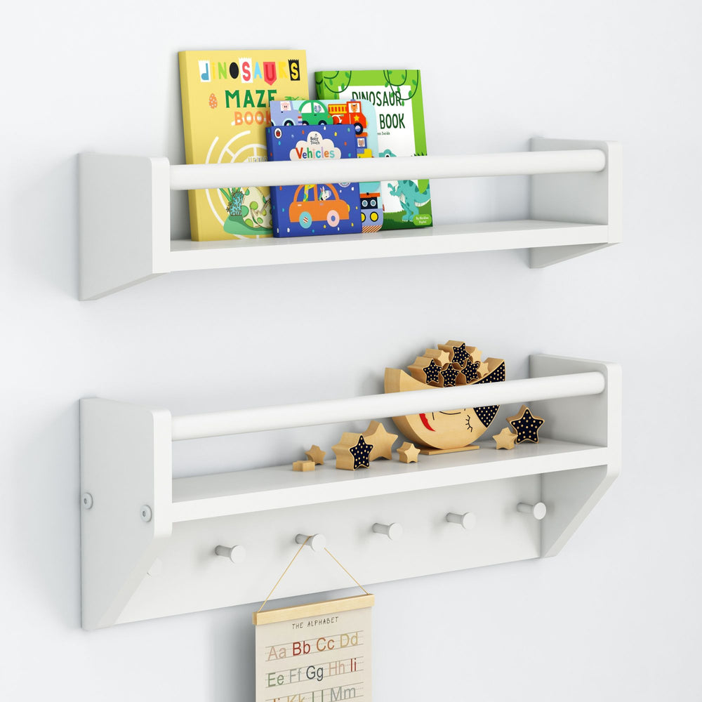 Children's bookshelf with books, toys, and educational decor on a white wall shelf unit.
