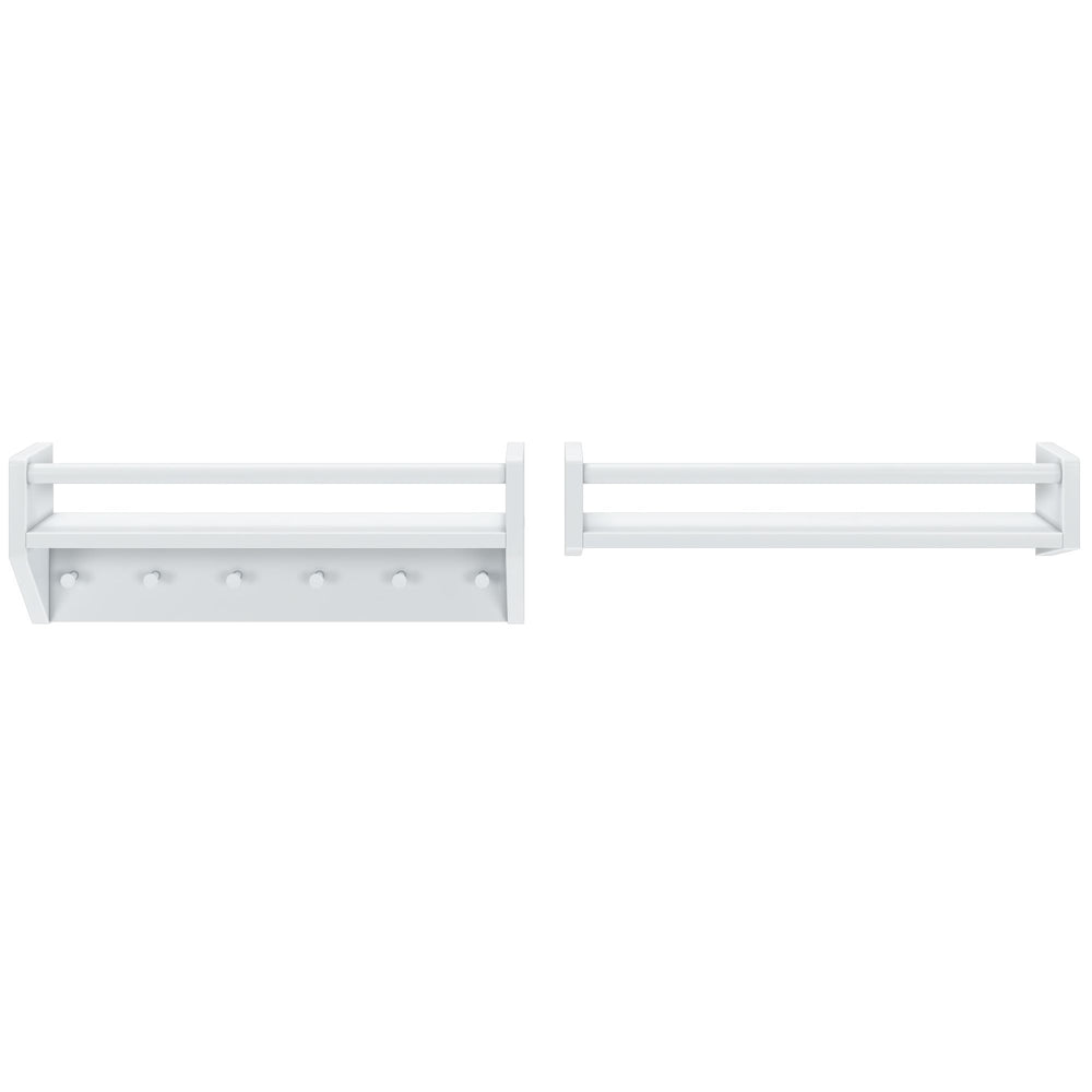 White wall-mounted peg rail with hooks and additional storage shelf for home organization.