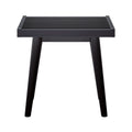 Black metal side table with slatted top and sleek modern design.