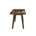 Side view of a modern slatted wooden bench with four legs, ideal for outdoor use.