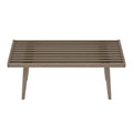 Mid-century modern wooden coffee table with slatted top design and angled legs.