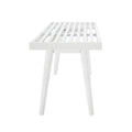 Modern white slatted bench with minimalist design and angled legs.