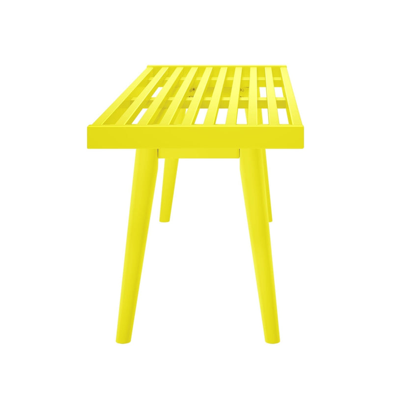 Bright yellow slatted wood bench with four legs against a white background.