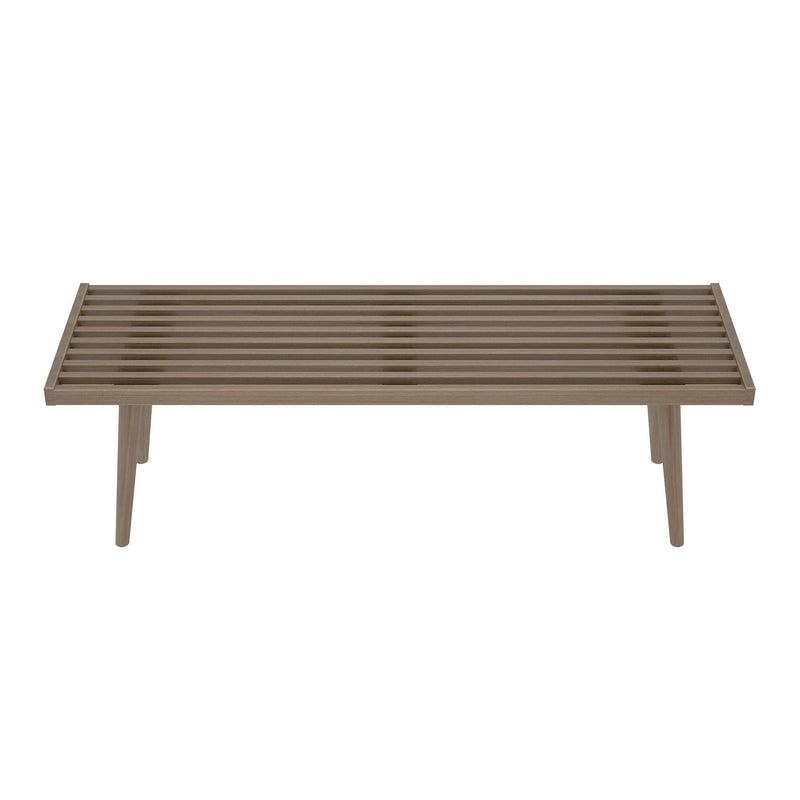 Minimalist wooden bench with slatted design and angled legs.