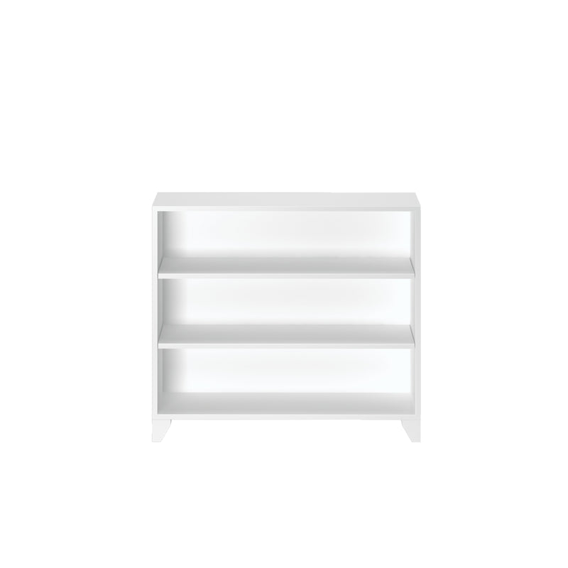 Minimalist white bookshelf with three shelves for modern home or office storage solutions.