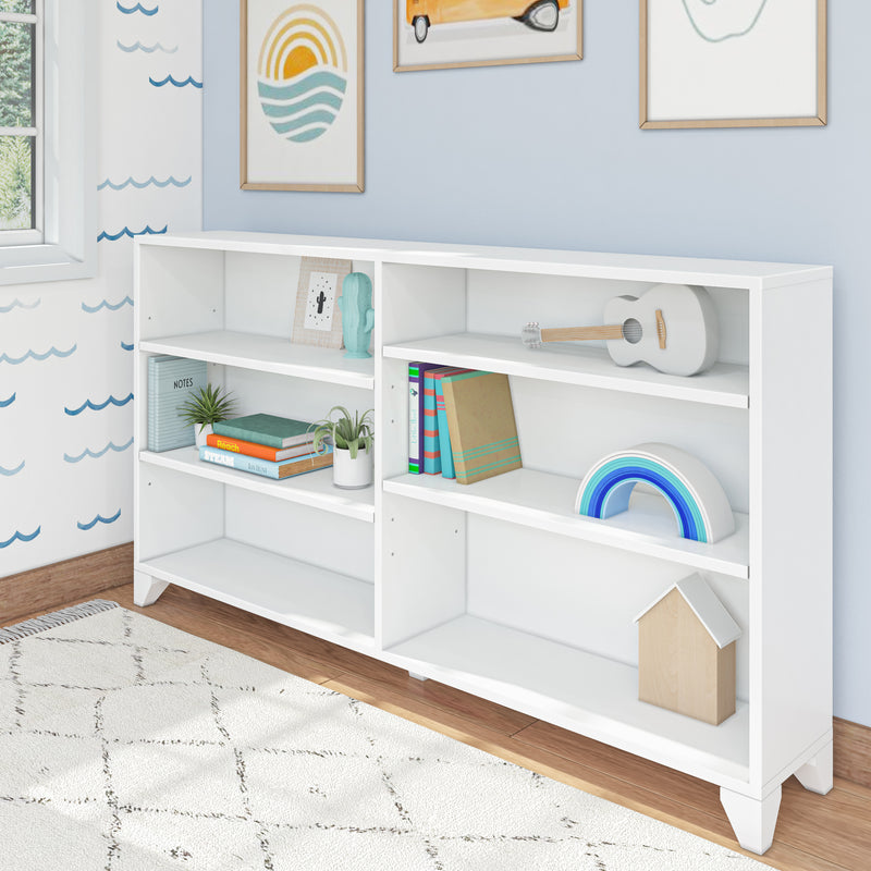 White bookshelf with decorative items and books in a modern blue-themed children's room.