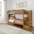 Natural wood twin-over-twin bunk bed with staircase, pink bedding and floral pillows in a bright modern kids' bedroom with framed wall art