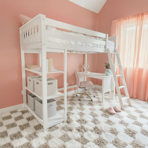 White loft bed with built-in desk and ladder in blush pink girl's bedroom with sheer curtains, plush shag rug, storage baskets and study chair