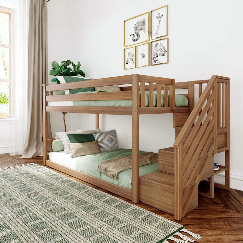 Stylish wooden bunk bed with stairs in a modern children's room featuring green and beige decor, wall art, and sunlight from a large window.