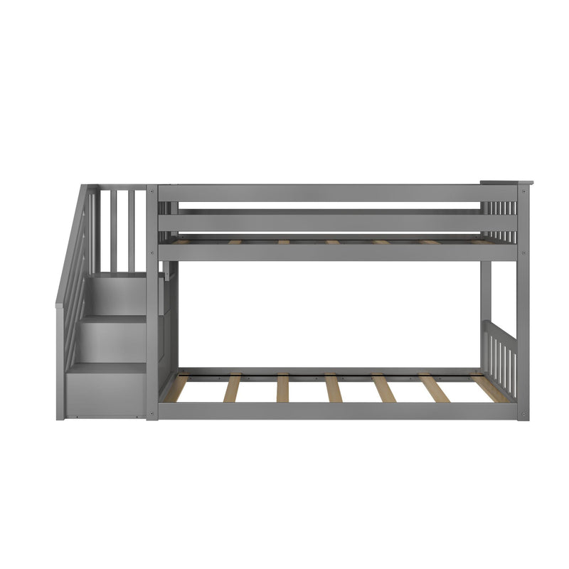 Gray twin bunk bed with storage stairs, modern kids' bedroom furniture.