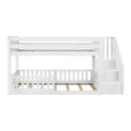 White wooden bunk bed with built-in staircase and storage drawers, safety guardrails and slatted mattress platforms for kids' bedroom