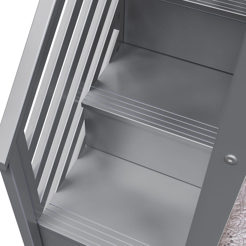 Modern gray metal staircase with safety guardrails for industrial and residential use.