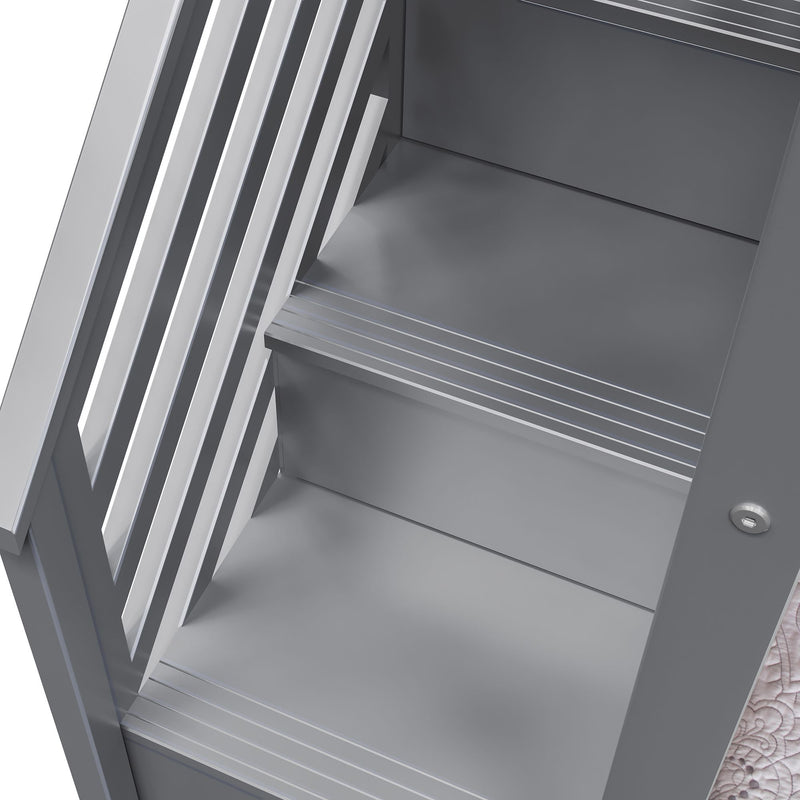 Gray metallic stair steps with modern design and railing detail.
