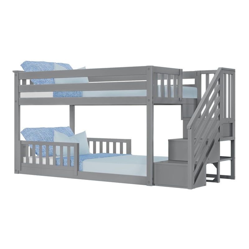 Gray wooden bunk bed with stairs and storage, featuring blue bedding.