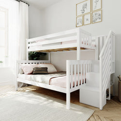 White wooden twin-over-full bunk bed with staircase and built-in storage, pink bedding and pillows in a bright modern children's bedroom with hardwood floors, sheer curtains, area rug and framed animal art